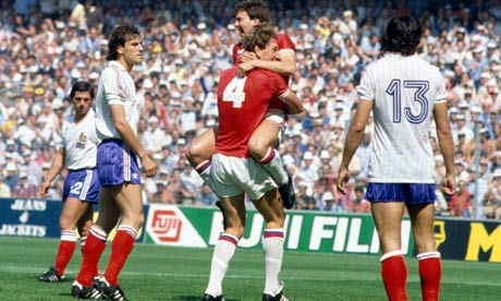 Bryan Robson celebrates with Terry Butcher after scoring in the England versus France match