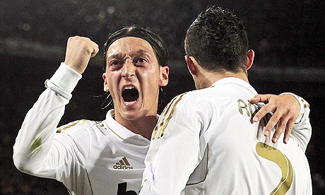 Ronaldo Ozil on Real Madrid S Mesut Ozil  Left  Congratulates Cristiano Ronaldo On His