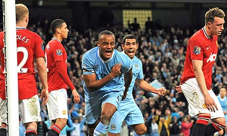 Manchester City's Vincent Kompany celebrates scoring the winner against Manchester United