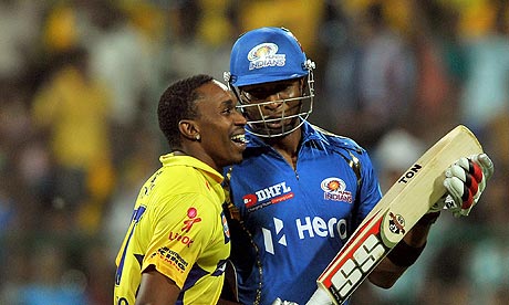Chennai Super Kings bowler Dwayne Bravo with Mumbai Indians' Kieron Pollard