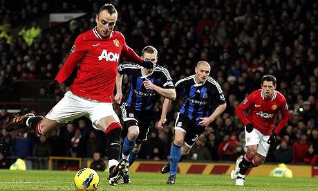 Dimitar Berbatov, left, has shown frustration at the lack of playing chances at Manchester United