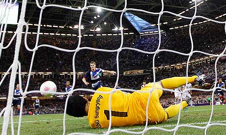 South Korea's Jung Sung-ryong saves a penalty from Team GB's Aaron Ramsey at the Olympics