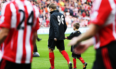 Steven Gerrard lead Liverpool out against Sunderland 