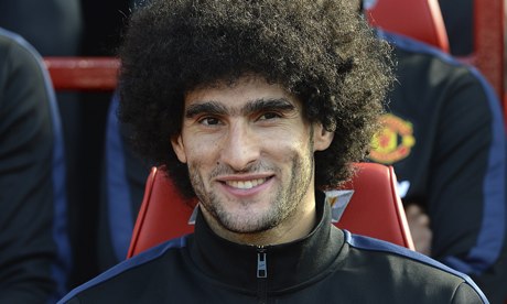 Manchester United's Marouane Fellaini is wanted by Belgium to train with a splint on injured wrist