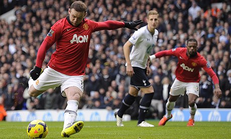 Wayne Rooney scores with a penalty