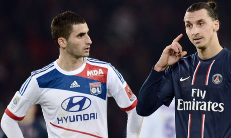 Lyon's Maxime Gonalons looks on next to PSG's Zlatan Ibrahimovic during a Ligue 1 game