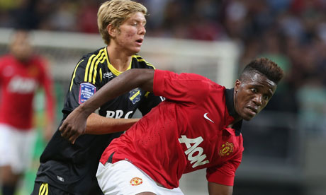 Manchester United's Wilfried Zaha, right