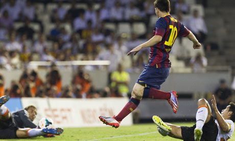 Lionel Messi sees his shot saved during Barcelona's 3-2 victory over Valencia at Mestalla