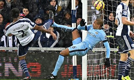 Fernando, right, scores with an overhead kick to give Manchester City the lead against West Brom.