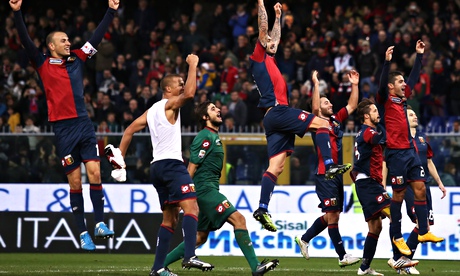 Genoa's players celebrate after their win over Milan