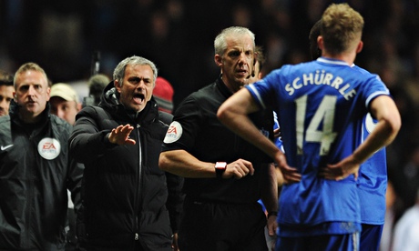 José Mourinho encroaches on to the Villa Park turf to remonstrate with Chris Foy