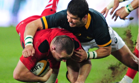 Morne Steyn tackles Ken Owens