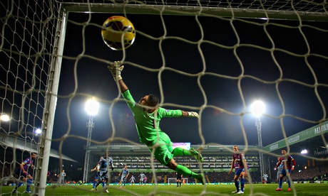 Papiss Cissé of Newcastle United scores the opening goal 