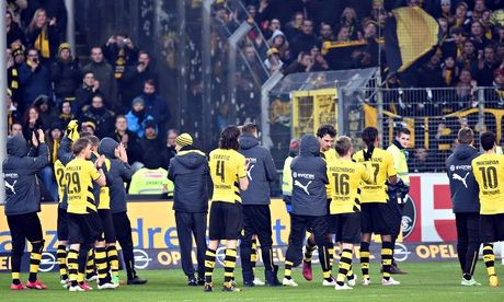 Borussia Dortmund's players thank their fans