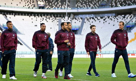 England players take a stroll around the Juventus Stadium where they play Italy.