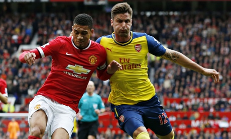 Chris Smalling, left, and Olivier Giroud (Manu U v Arsenal)