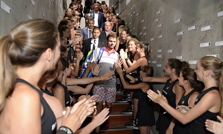 Stanislas Wawrinka and his famous shorts head for the locker room after securing victory at Roland G