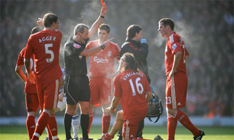 Referee gives red card in Liverpool v Everton, Anfield, 2010