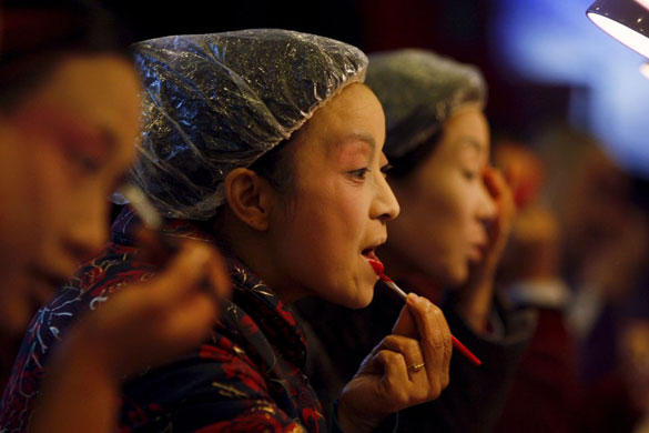 Gallery November 10 2008: Chengdu, China: Artists put on makeup before a performance of Sichuan Opera