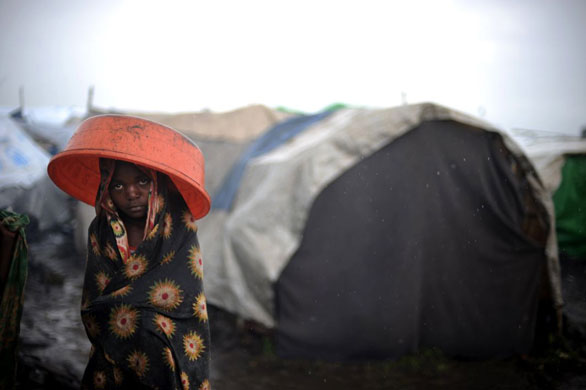 Gallery November 11 2008: Kiwanja, Congo: A girl living in an improvised shelter