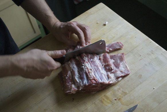 Gallery Butchering a lamb carcass: Lamb. Cleave throught the spine