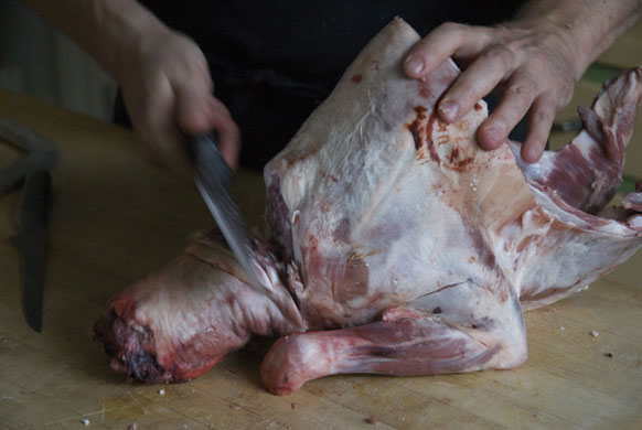 Gallery Butchering a lamb carcass: Lamb. Use the cleaver to remove the neck