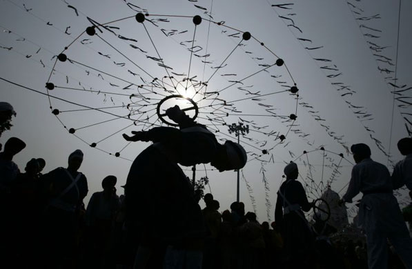 Gallery November 12 2008: Amritsar, India: A Sikh warrior performs a martial art called gatka