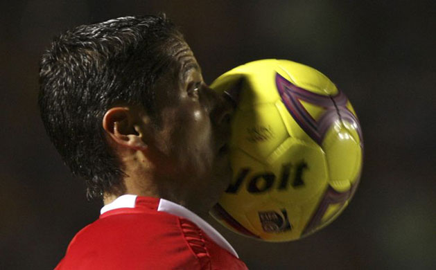 Gallery Week in sport: Monterrey, Mexico: Toluca's Carlos Esquivel controls the ball