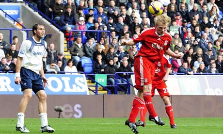 Dirk Kuyt opens the scoring for Liverpool against Bolton at the Reebok. 