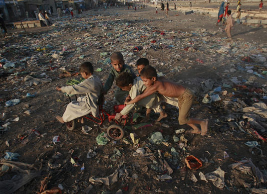 Gallery Children in Karachi: Children play in a slum area of Karachi