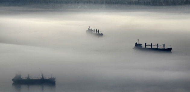 Gallery November 18 2008: Ships enveloped in morning fog on English Bay in Vancouver