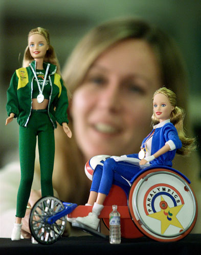 Gallery Barbie: A woman looks at the latest Barbie dolls to hit the Olympic Store in Sydney