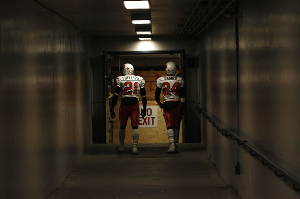 Gallery Sport pictures: BC Lions Ryan Phillips and Korey Banks walk to their dressing room