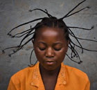 Serafin Nyanzaba wears a traditional hair style in eastern Congo