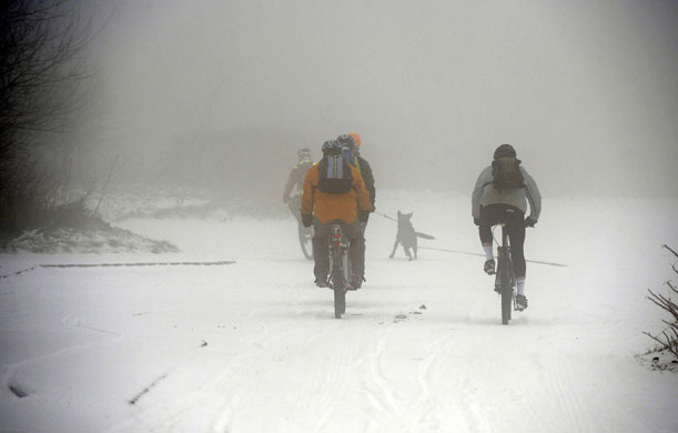 Gallery Snow update: Cyclist pedal through snow at Sutton Bank near Thisk