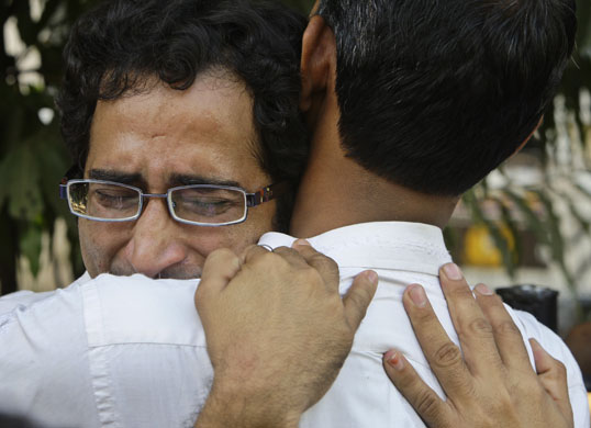 Gallery Mumbai terror attacks: A grieving releative of terror attacks at the St Georges Hospital in Mumbai
