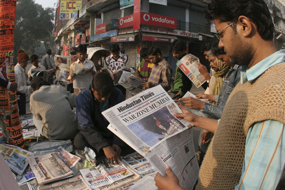 Gallery Mumbai aftermath: People read newspaper reports of the Mumbai attacks