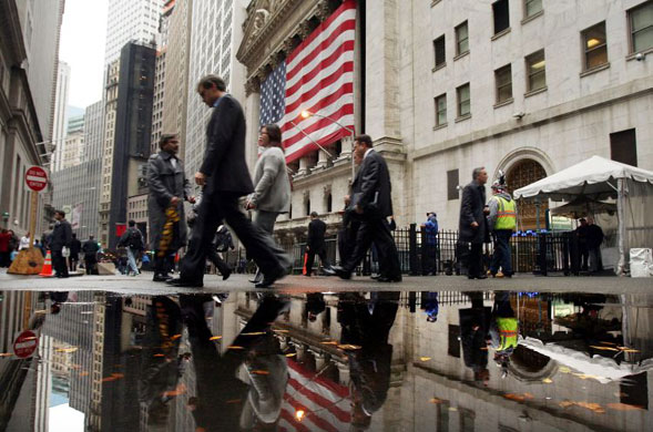 Gallery November 7 2008: People walk by the New York Stock Exchange
