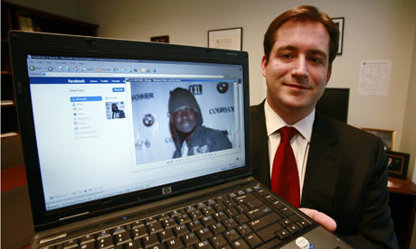 Assistant US attorney Michael Scoville displays the Facebook page of fugitive Maxi Sopo