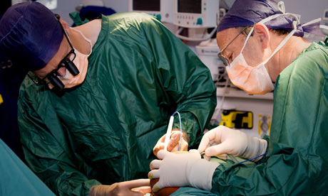 Doctors during surgery to separate conjoined twins Krishna and Trishna
