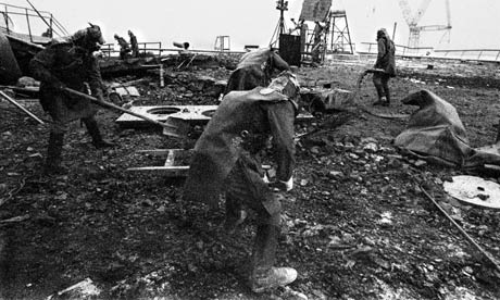 Workers remove radioactive debris from third reactor's roof at Chernobyl nuclear power plant