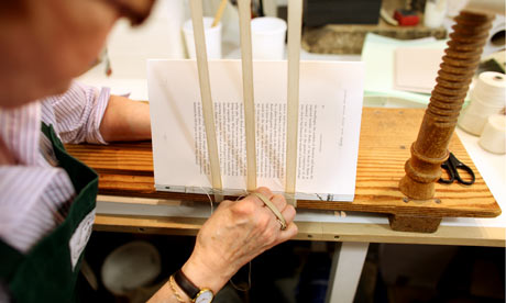 Alison Strachan, traditional craft bookbinder, at work at Shepherd's Bookbinder, London