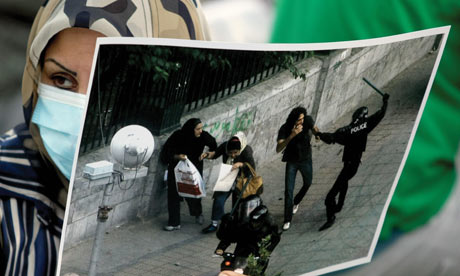 http://static.guim.co.uk/sys-images/Guardian/About/General/2009/7/1/1246476270209/Iran-protests-woman-holds-001.jpg