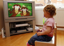 Pre-school child watchesTV