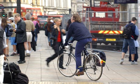  - Cyclist-riding-on-the-pav-001