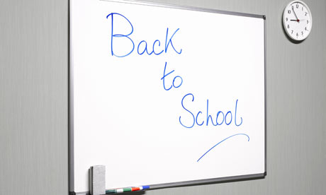 Back to school written on a whiteboard