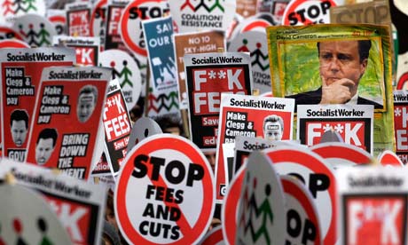 Student protests as ministers vote rise in tuition fees .