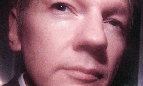 Julian Assange leaves court