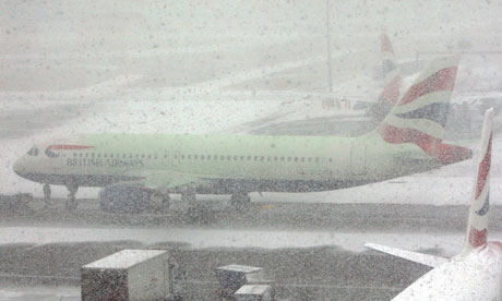 Snow showers as planes are grounded at Heathrow airport