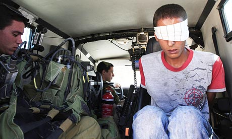 Palestinian held by Israeli soldiers